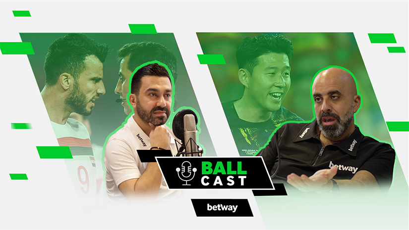 Promotional image for Ball Cast by Betway Arabia, featuring four men: two on the left in close conversation, and two on the right engaged in discussion. A microphone and the Ball Cast logo are centered between them.