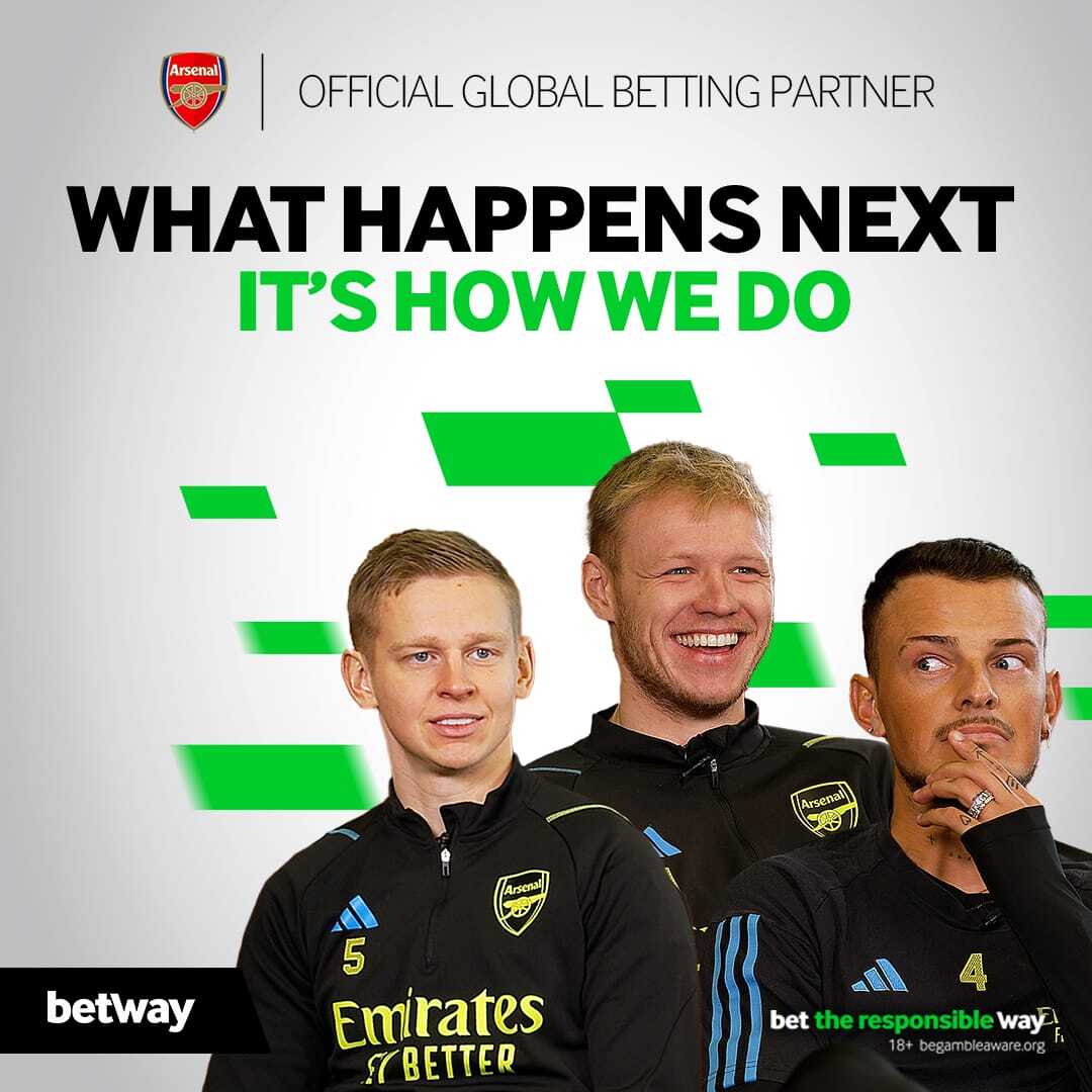 Three people in black jerseys featuring the yellow Emirates logo, representing Arsenal, stand smiling. The image highlights the Arsenal and Betway logos with text: What Happens Next Its How We Do and Official Global Betting Partner. Experience it with Betway Arabia.